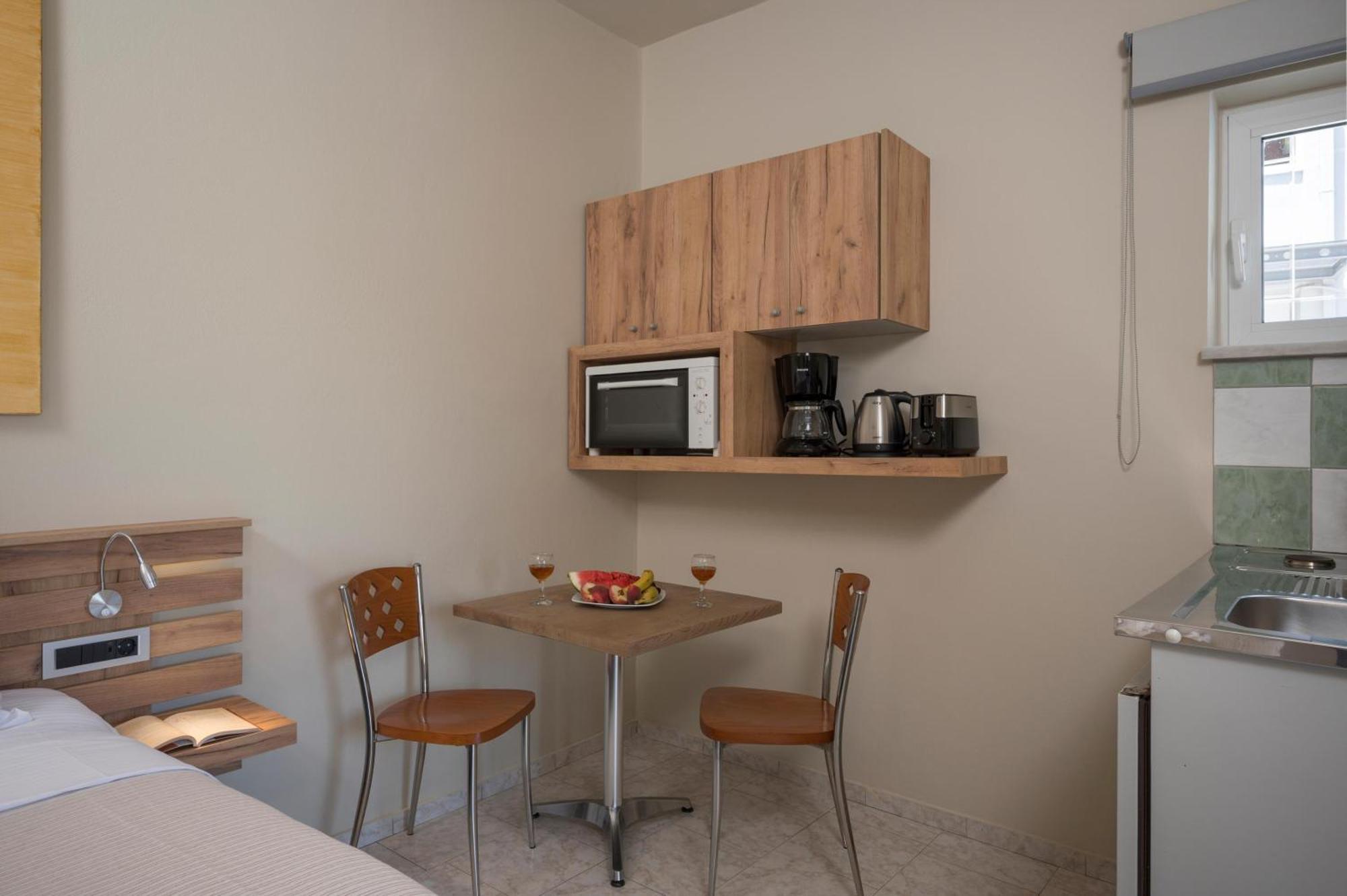 Sun Ray Luxury Apartments Agia Marina Habitación foto